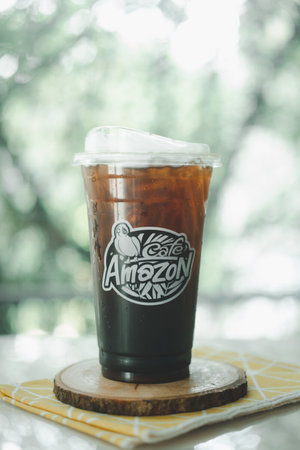 Samut Prakan, Thailand - January 22, 2021: Honey black coffee sweet and mild iced black coffee with...