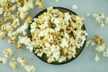 Homemade crunchy caramel popcorn. Selective focus