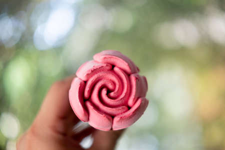 Samut Prakan, Thailand - February 2, 2021 : The new ice cream Cornetto Love Rose comes with the shape of a beautiful rose when you remove the upper lid, perfect for Valentineâs Dayのeditorial素材