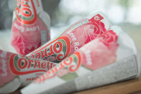 Samut Prakan, Thailand - February 2, 2021 : Selective focus of new ice cream Cornetto Love Rose comes a beautiful rose when you remove the upper lid. a new pink Japanese-inspired ice cream flavourのeditorial素材