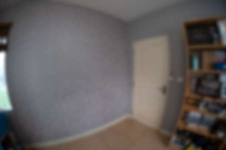 Blur background image of modern room with wooden shelf  interior taken with a fisheye lensの写真素材