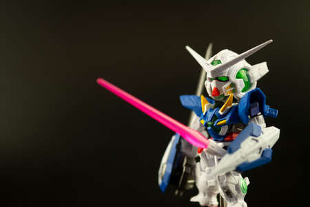 Samut Prakan, Thailand - February 14, 2021 : The setting of action figures Gundam on a black background. Gundam plastic model from anime tv series mobile suit gundam.のeditorial素材