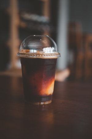 Iced black coffee or iced Americano mix orange smoothie. The fusion summer drink. Is the perfect combination.の写真素材