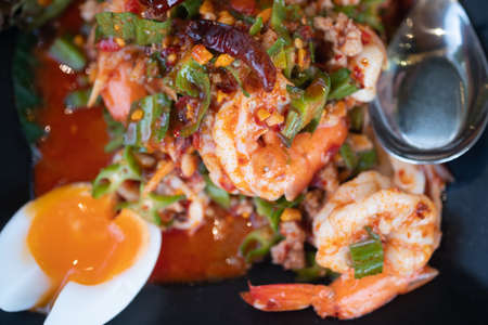 Wing bean shrimp salad is a central Thai dish featuring âwing beansâ which are blanched and tossed with coconut milk, roasted chili paste, toasted coconut, tamarind, palm sugar and peanuts.の写真素材