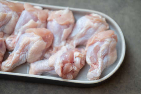 Raw fresh chicken drumsticks for is various cooking as boiled, grill and fried