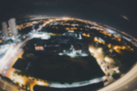 Night bokeh light in big city, abstract blur defocused background. Fisheye lens