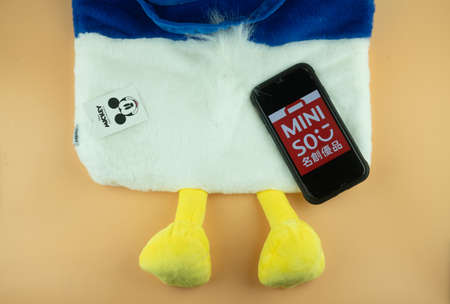 Bangkok, Thailand - March 20, 2021: Miniso Mickey Mouse and Friends Collection. Miniso X Mickey Mouse, products sell in Thailand. MINISO is a Chinese retail network that sells a variety of goodsのeditorial素材