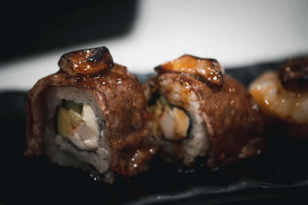 Beef maki sushi on top with foie gras. Selective focusの写真素材