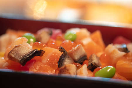 Chirashi, also called chirashizushi big bowl of rice mixed with many raw fish. Selective focusの写真素材