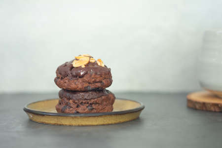 Pile of Chocolate Scones on top with nut.の写真素材
