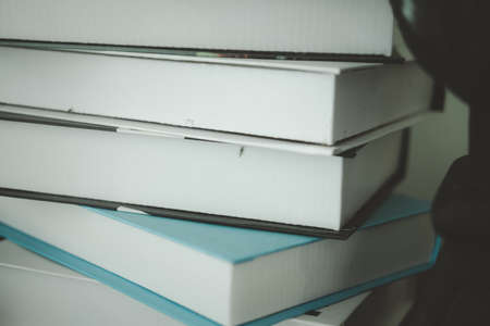 Pile of artificial book decoration in cafeの写真素材