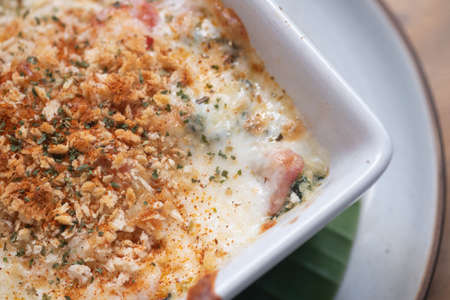 Close up spinach lasagna in white plate - Italian food styleの写真素材