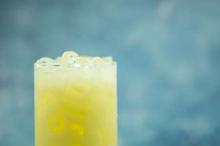 A glass of milk curd with ice. Selective focusの写真素材