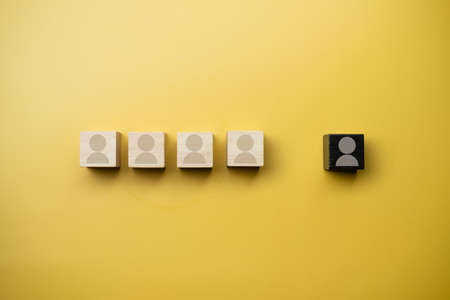 People icon on cube wooden block in a row. Concepts of human resources personnel selection and person organization job fit and employees performance.の写真素材