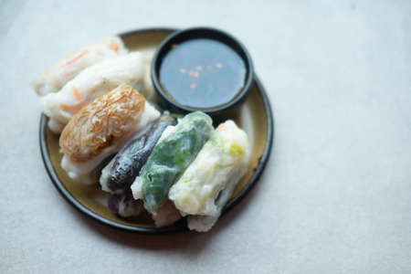 Mix of various steamed dumpling stuffed such as garlic chives, taro and bamboo shoot with sweet...