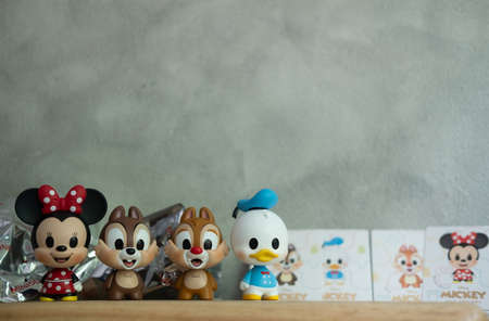 Samut Prakan, Thailand - May 5, 2021 : Figurine of Mickey mouse family figures mystery box blind box from Miniso sell start in Thailand at 9 April 2021のeditorial素材