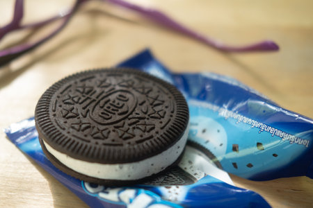 Samut Prakan, Thailand - May 5, 2021 : Oreo ice cream sandwiches place with packaging on wood tableのeditorial素材