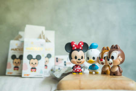 Samut Prakan, Thailand - May 5, 2021 : Figurine of Mickey mouse family figures mystery box blind box from Miniso sell start in Thailand at 9 April 2021のeditorial素材