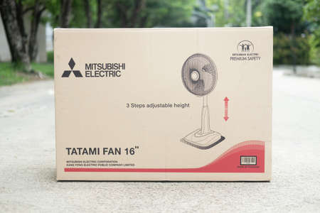 Samut Prakan, Thailand - May 9, 2021 : Brown box with soft gray electric fan size of 16 inches...