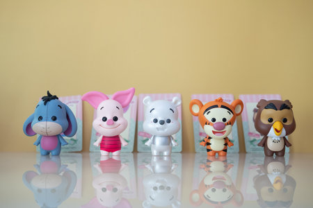 Samut Prakan , Thailand - May 20, 2021 : Cute figurine of Winnie the pooh Figures Mystery Blind box collection sell in Miniso shop in Thailand.のeditorial素材