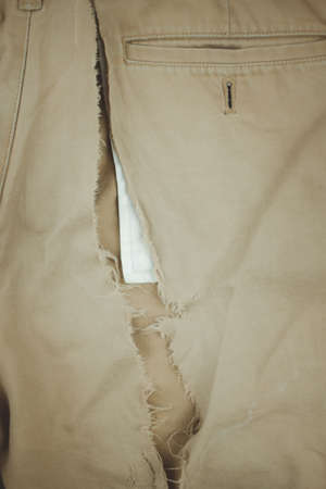 Men's pants torn stylish pants. Casual men clothes, fashion design conceptの写真素材