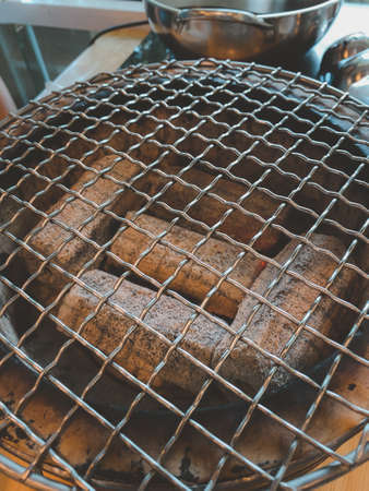 Close up of coal burning in barbecueの写真素材