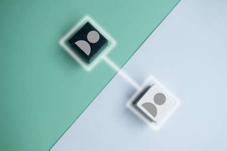 Connecting icon people wooden cube block for social media networking.  Organization structure, social network, leadership, team building.の写真素材