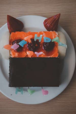 Happy Birthday sign on chocolate cake. Party in homeの写真素材