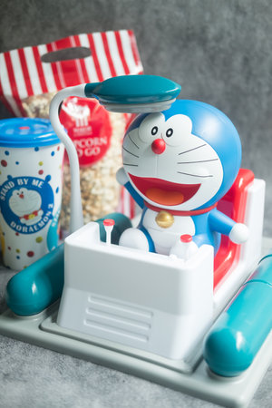 Bangkok, Thailand - June 14, 2020 : Doraemon time machine bucket set popcorn and soft drink, promote the movie : Japanese Animation Stand by Me Doraemon 2 at the Theater from Major Cineplex Group Plc.のeditorial素材