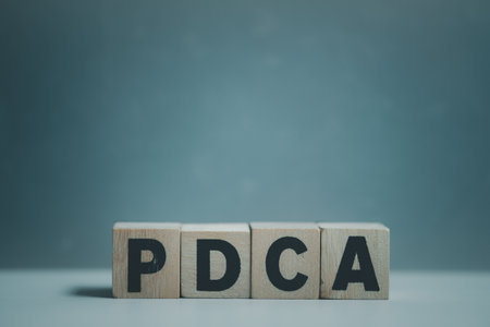 Alphabet letter block in word PDCA. About PDCA that is four steps management method: PLAN, DO, CHECK and ACT for control and continual improvement of business conceptの写真素材