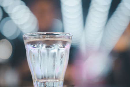 Close up the purified fresh drink water with bokeh backgroundの写真素材