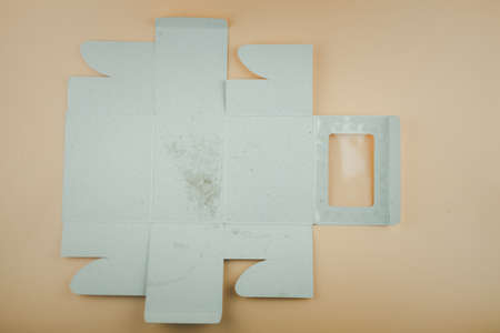 Template of old paper box packaging on a yellow background. DIe-cut pattern.