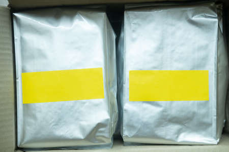 Foil plastic paper bag for coffee beans package. Top viewの写真素材