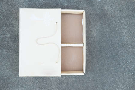 White little cardboard sliding box with drawer. Top viewの写真素材