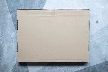 Top view of cardboard blank brown boxの写真素材