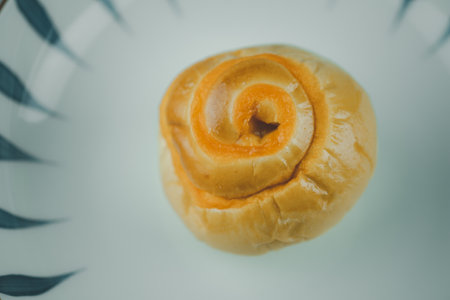A bread with milk tea custard. Top viewの写真素材
