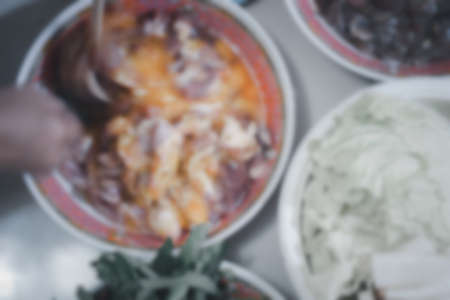 Blur background of making and prepare sukiyaki in home