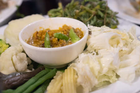 Spicy crab roe chili sauce served with vegetable (Thai food)の写真素材