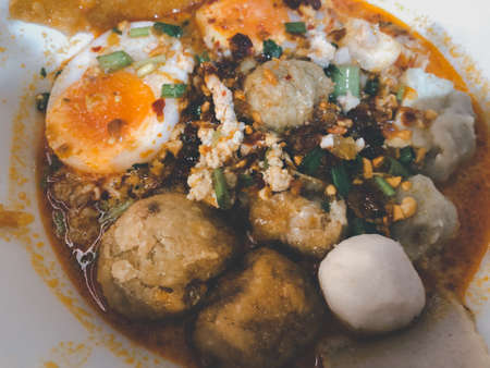 Close up of many meatball tom yum noodles. Thai foodの写真素材