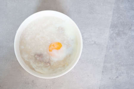 Rice porridge or congee is similar to boil rice but it has softer texture with egg