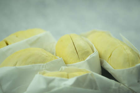 Durian meat in a white paper. Selective focusの写真素材