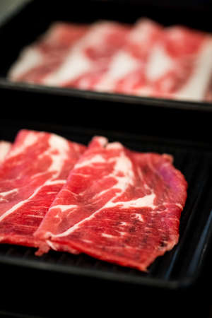 Thin slices of beef for cooking Shabu Shabu or Sukiyaki