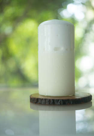 Fresh milk blended with yogurt or milk in glass, healthy eatingの写真素材