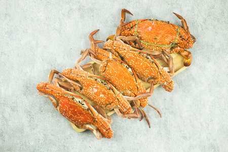Steamed blue swimming crab on wood tray, Thai seafoodの写真素材