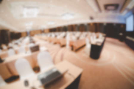Abstract blurred photo of empty conference hall for seminar in convention hall of hotelの写真素材