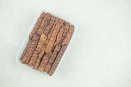 Sweet tamarind in box, exposed to the sun, Tamarind for health, organic tamarind natureの写真素材