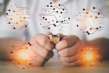 Man show wooden USB with circle of technology lines. Let's get connectedの写真素材