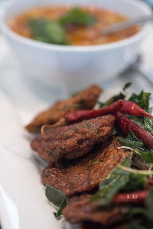 Deep fried fish paste balls (deep fried curried fish patties). Close upの写真素材