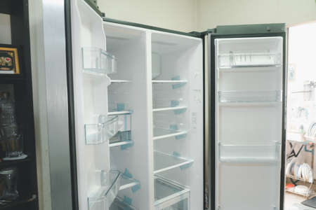 Samut Prakan Thailand - October 1, 2021 : Open two door HITACHI refrigerator Silver fridge with side-by-side door system.のeditorial素材