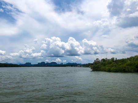 Cloudy sky and river. Take a photo from boat